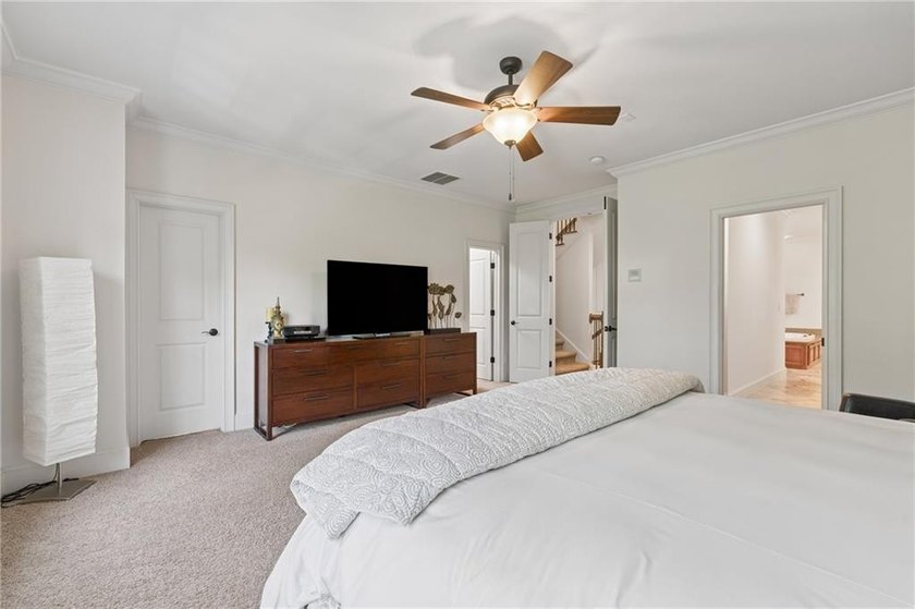 Set behind the gates of One Ivy Walk, this brick townhome offers - photo 24
