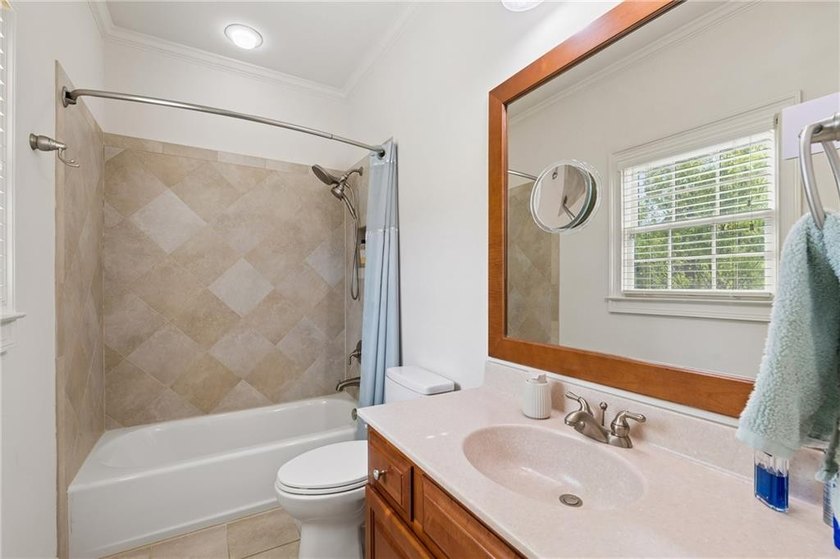 Set behind the gates of One Ivy Walk, this brick townhome offers - photo 33