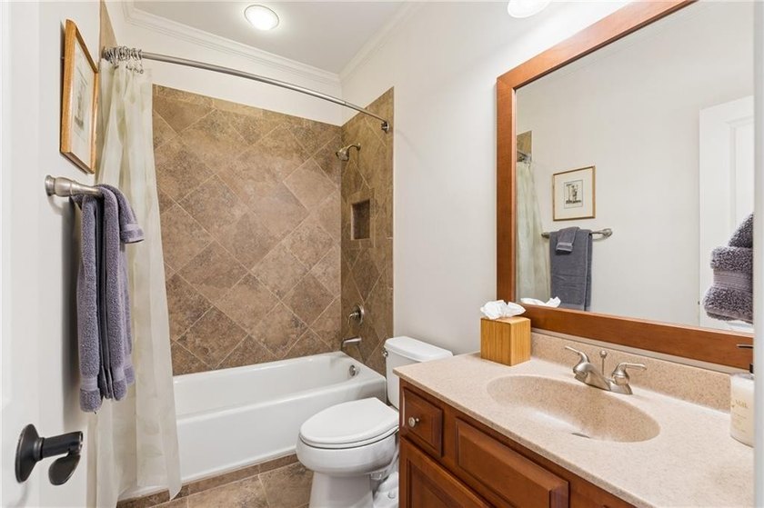 Set behind the gates of One Ivy Walk, this brick townhome offers - photo 37