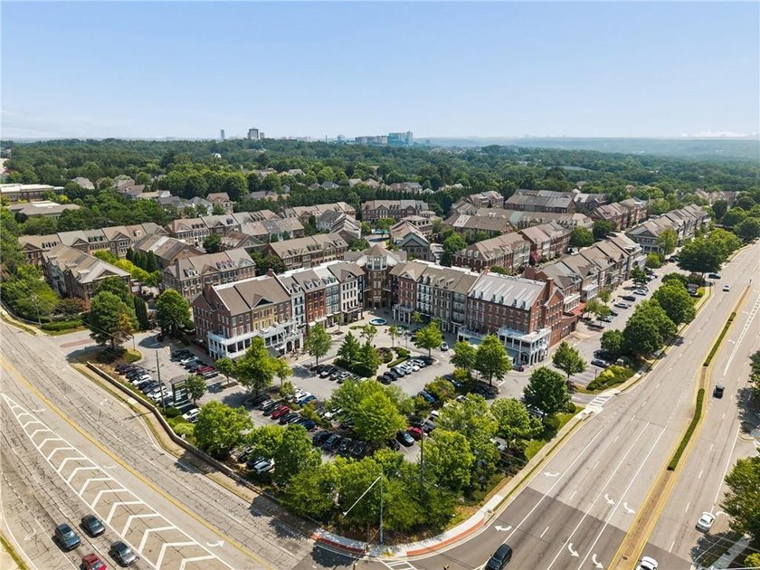 Set behind the gates of One Ivy Walk, this brick townhome offers - photo 48