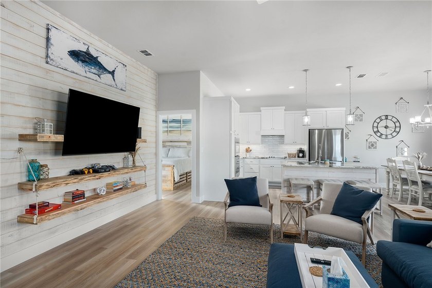 Experience coastal living at its finest in this beautifully - photo 12