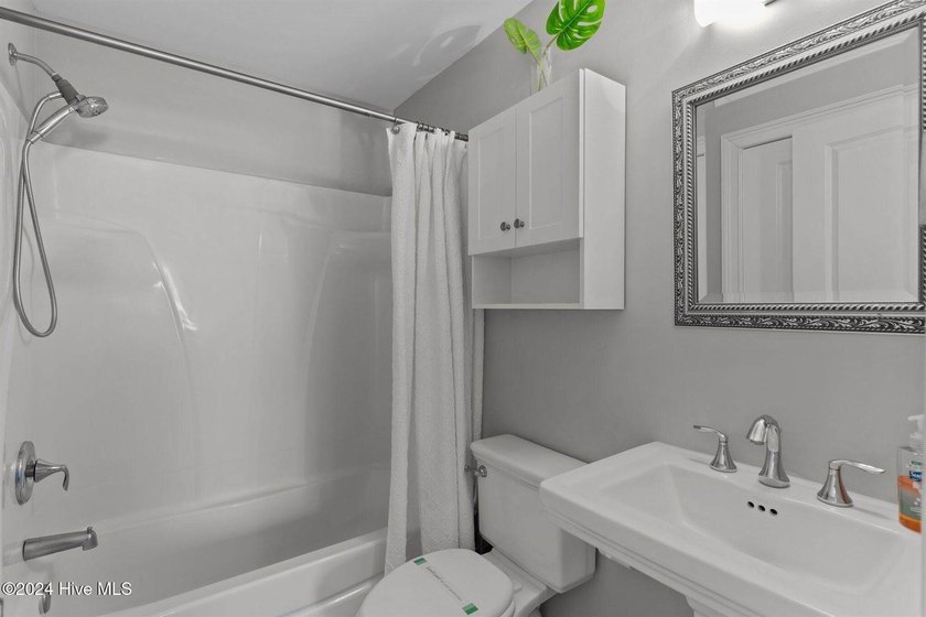 Welcome to effortless coastal living in Carolina Beach. This - photo 28