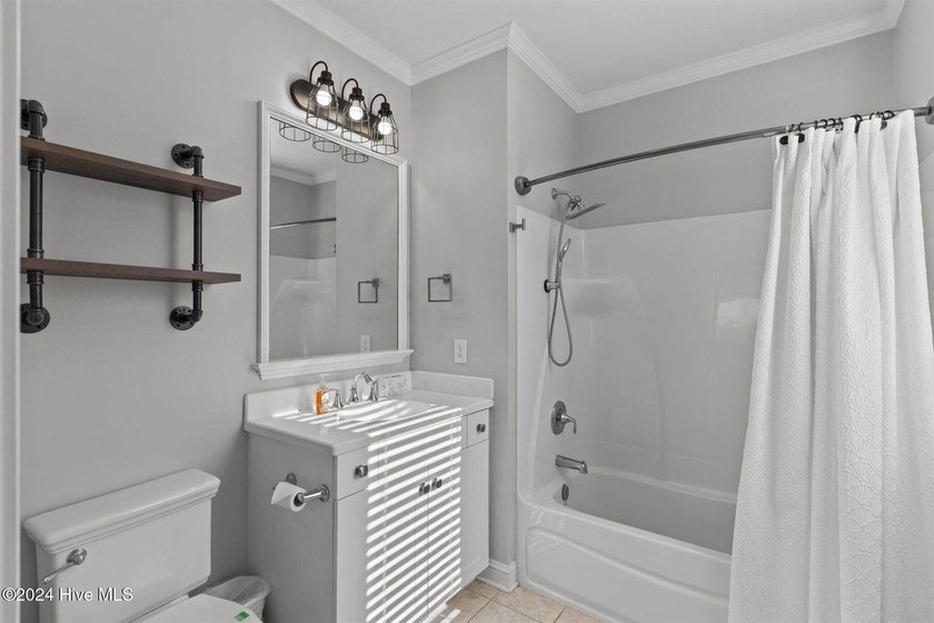 Welcome to effortless coastal living in Carolina Beach. This - photo 29