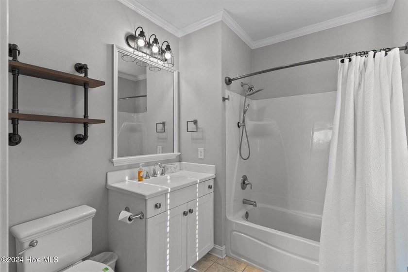 Welcome to effortless coastal living in Carolina Beach. This - photo 30