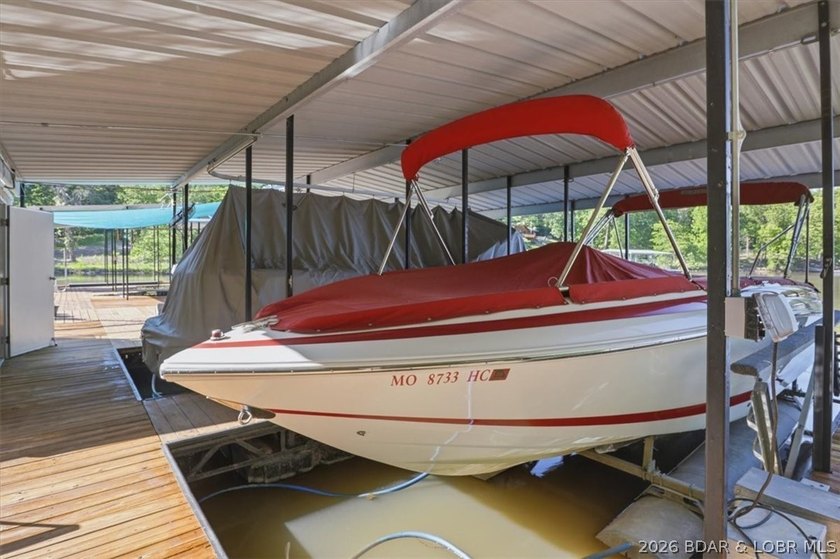 Tucked into the trees on over 8 acres at the 47MM in cove, this - photo 47