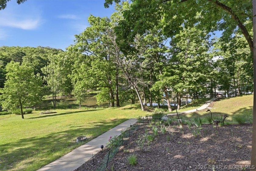 Tucked into the trees on over 8 acres at the 47MM in cove, this - photo 49