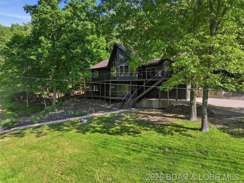 Tucked into the trees on over 8 acres at the 47MM in cove, this - photo 50