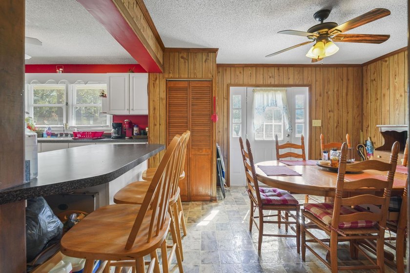 Charming 4-bedroom home situated on a spacious corner lot shaded - photo 15