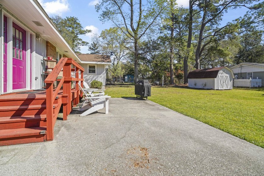 Charming 4-bedroom home situated on a spacious corner lot shaded - photo 32