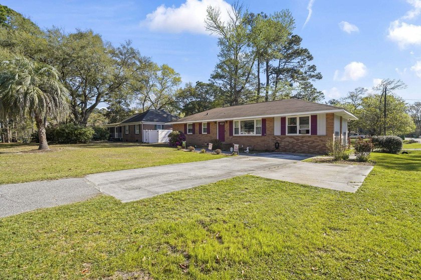 Charming 4-bedroom home situated on a spacious corner lot shaded - photo 38