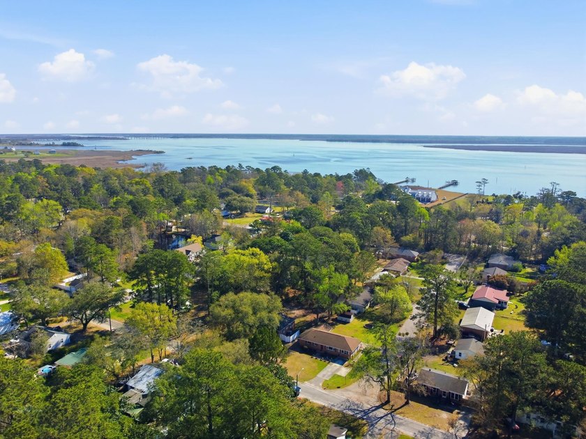 Charming 4-bedroom home situated on a spacious corner lot shaded - photo 42