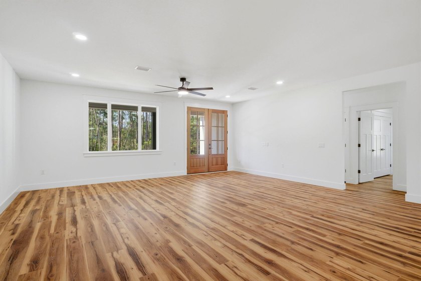 Welcome to 8756 Sand Pine Drive--a truly rare new-construction - photo 11