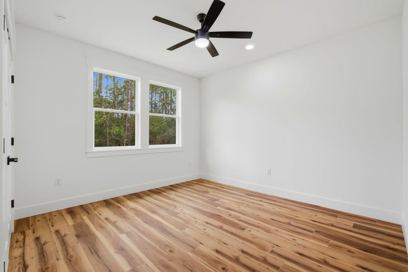 Welcome to 8756 Sand Pine Drive--a truly rare new-construction - photo 23