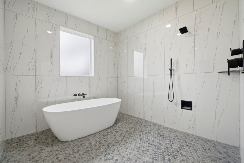 Welcome to 8756 Sand Pine Drive--a truly rare new-construction - photo 30