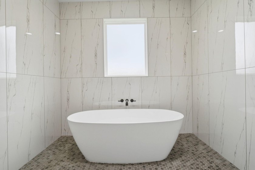 Welcome to 8756 Sand Pine Drive--a truly rare new-construction - photo 31