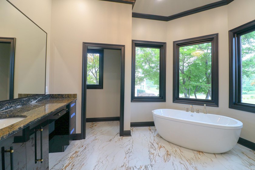 This stunning all-brick home, has been completely remodeled to - photo 29