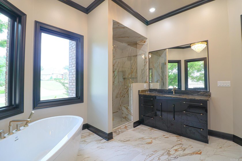 This stunning all-brick home, has been completely remodeled to - photo 30