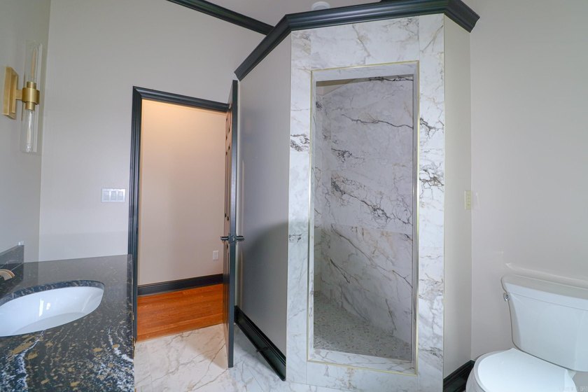 This stunning all-brick home, has been completely remodeled to - photo 39
