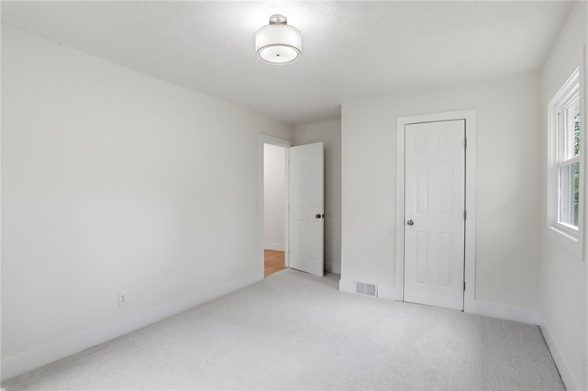 MOVE IN READY 3-bedroom, 1.5-bath ranch with a 1-car garage and - photo 12