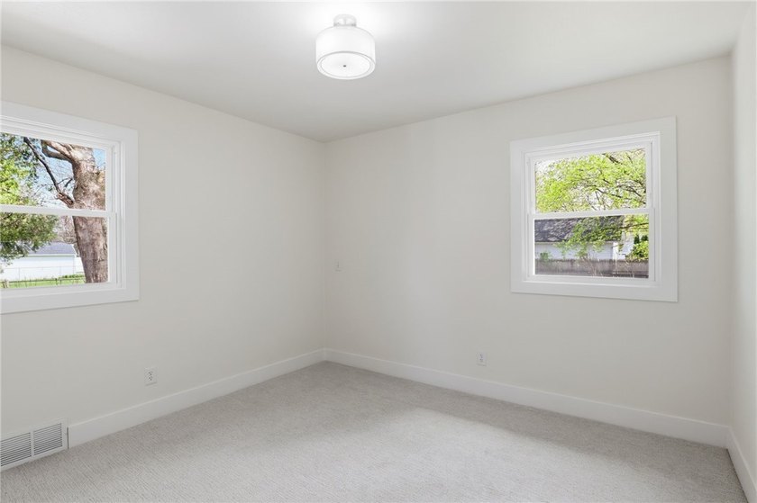 MOVE IN READY 3-bedroom, 1.5-bath ranch with a 1-car garage and - photo 15