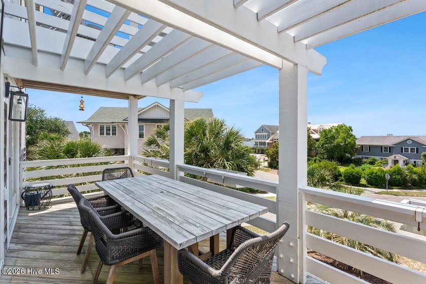 Set on one of Wrightsville Beach's most coveted streets in the - photo 18
