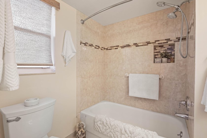 WELCOME TO THIS VERY DESIRABLE CORNER CONDO WITH BEAUTIFUL WATER - photo 21