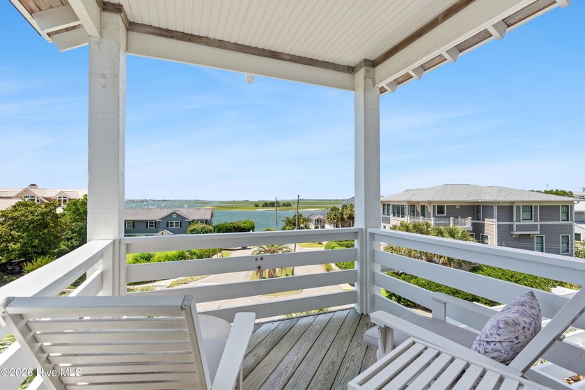 Set on one of Wrightsville Beach's most coveted streets in the - photo 24
