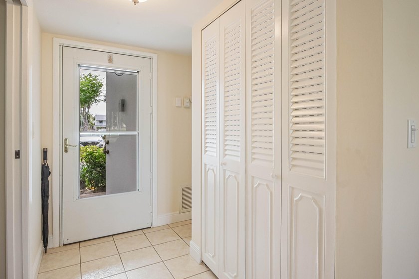 WELCOME TO THIS VERY DESIRABLE CORNER CONDO WITH BEAUTIFUL WATER - photo 25