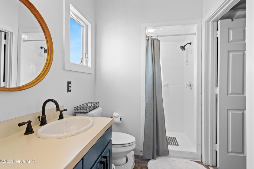 Set on one of Wrightsville Beach's most coveted streets in the - photo 27