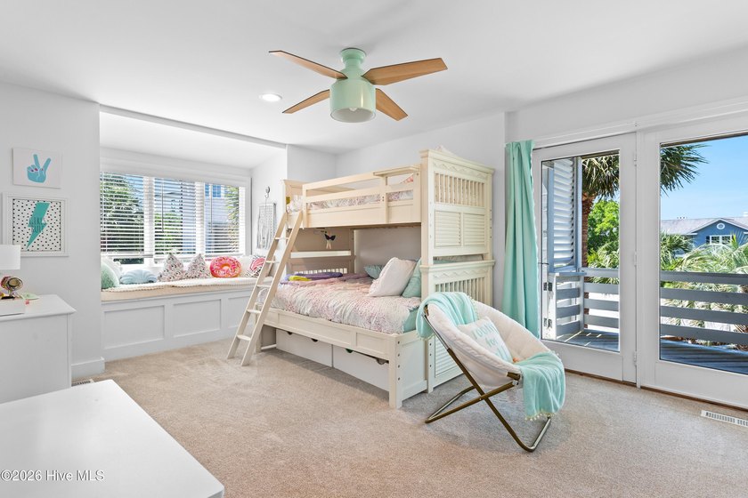 Set on one of Wrightsville Beach's most coveted streets in the - photo 29