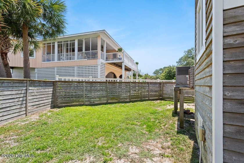 Set on one of Wrightsville Beach's most coveted streets in the - photo 46