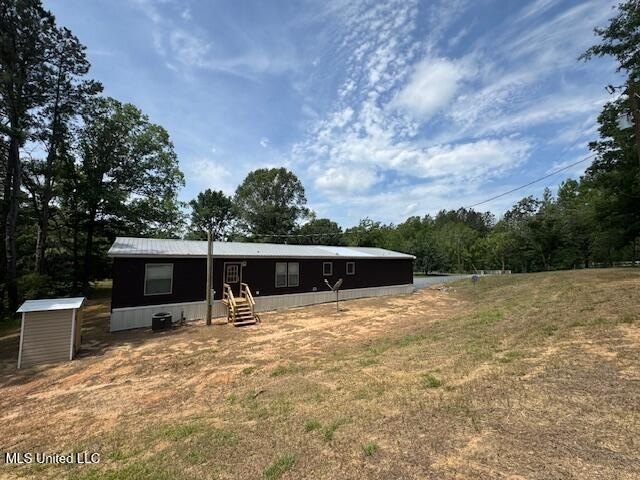 Hilltop Residence and new doublewide overlook a stocked lake and - photo 46