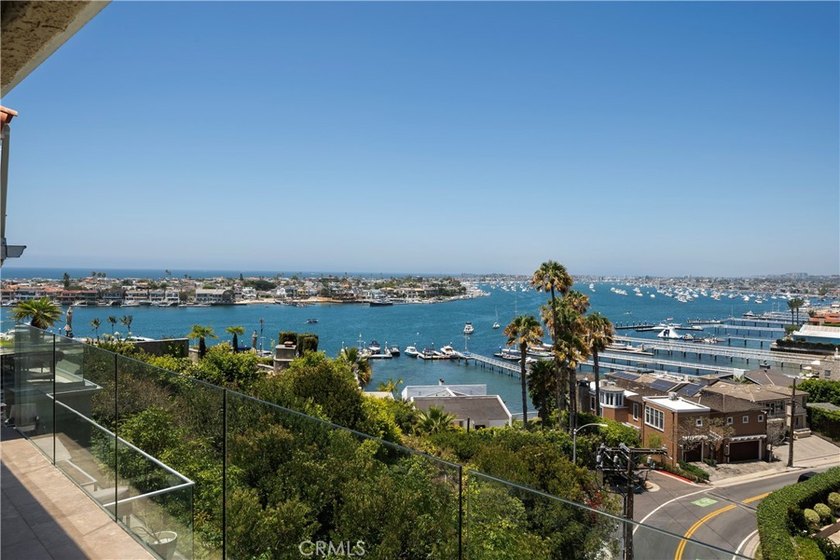 Perched on the coveted Corona del Mar bluff, this exceptional - photo 12