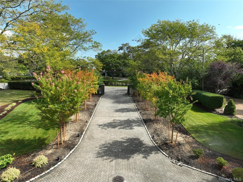 Privately gated, prestigious waterfront home in the heart of - photo 4