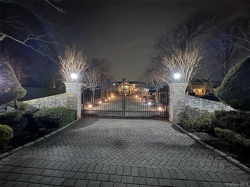 Privately gated, prestigious waterfront home in the heart of - photo 5
