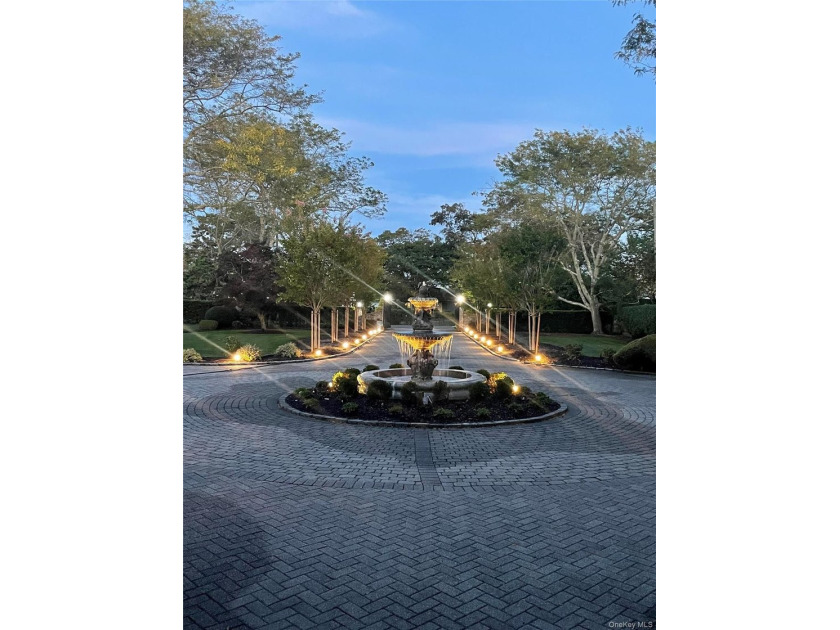Privately gated, prestigious waterfront home in the heart of - photo 6