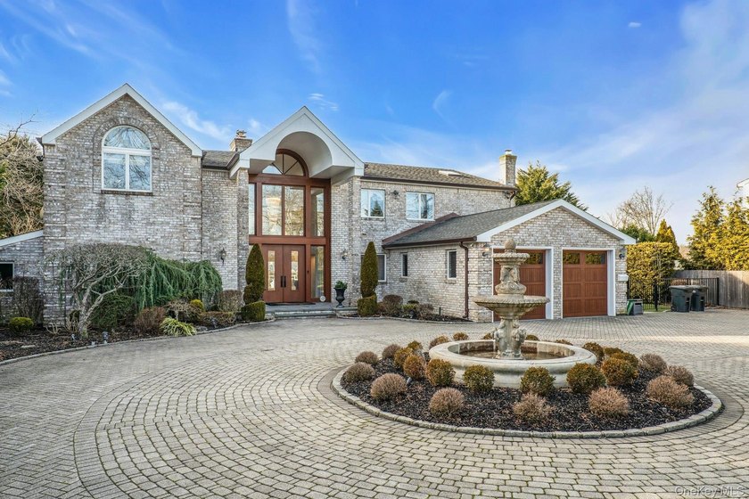 Privately gated, prestigious waterfront home in the heart of - photo 7