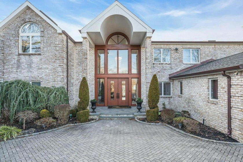 Privately gated, prestigious waterfront home in the heart of - photo 8