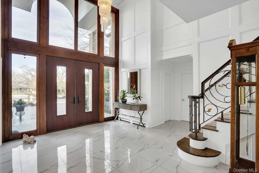 Privately gated, prestigious waterfront home in the heart of - photo 10