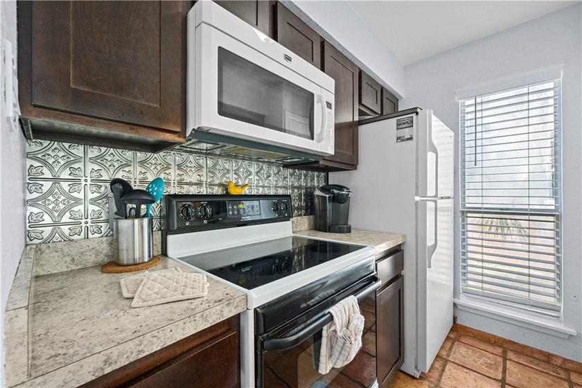 Immaculate, fully furnished 3/2 two story condo. Great views of - photo 3