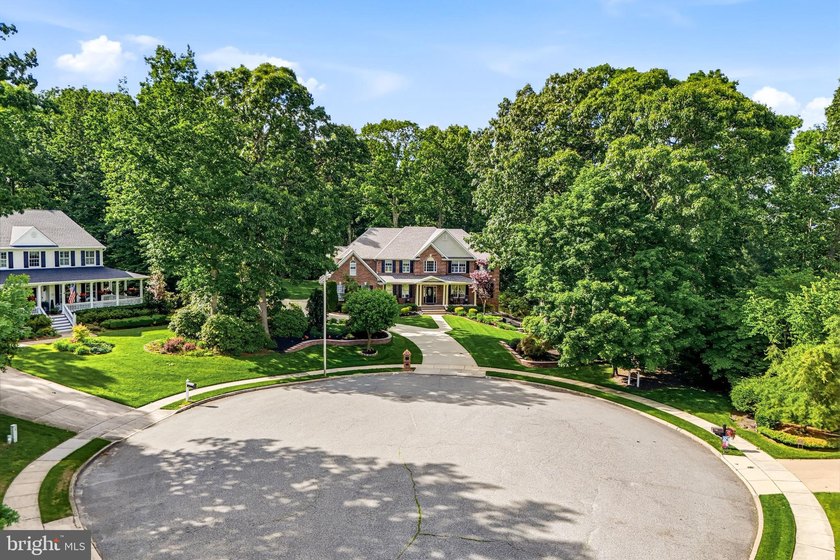 Welcome to 25 Foxtail Court, an extraordinary custom-built - photo 5