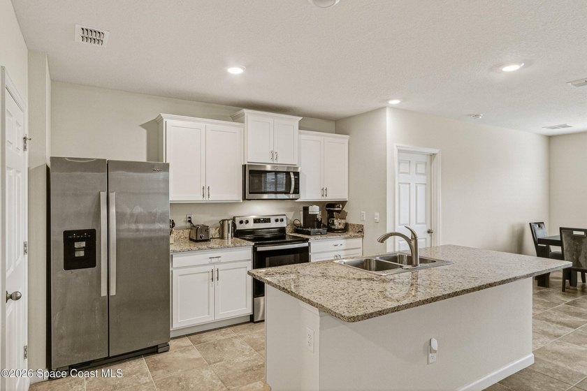 Welcome home to this beautifully upgraded 3BR/2BA residence - photo 10