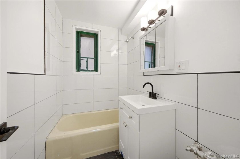 Welcome to this fully gut-renovated 1-bedroom condo in the heart - photo 3