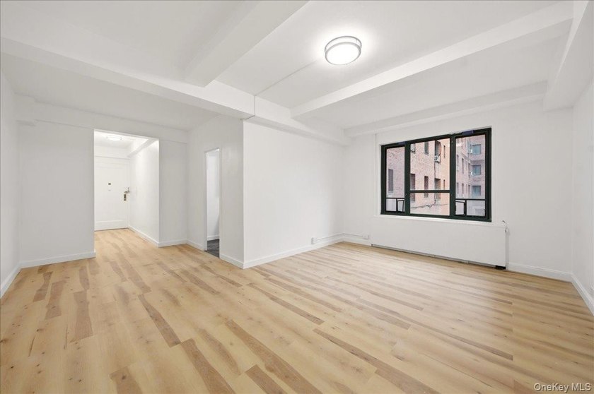 Welcome to this fully gut-renovated 1-bedroom condo in the heart - photo 6