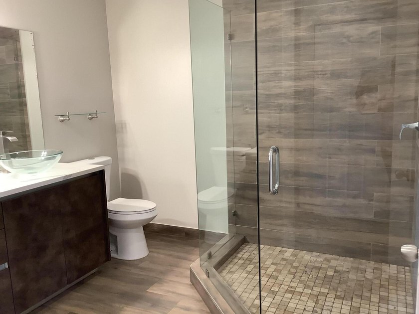 This beautifully renovated 2-bedroom, 2-bathroom townhouse is - photo 13