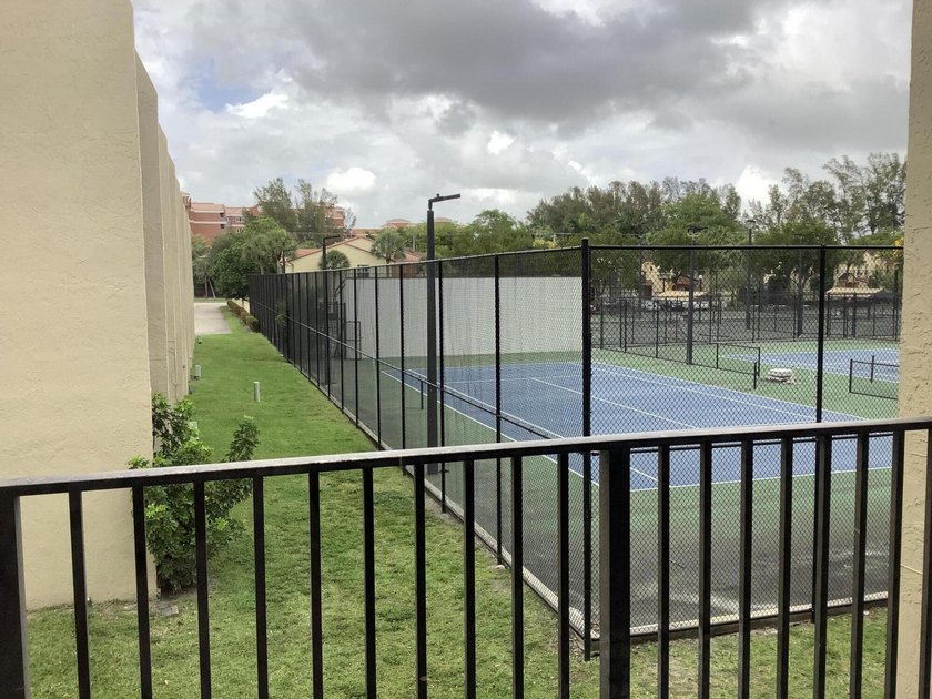 This beautifully renovated 2-bedroom, 2-bathroom townhouse is - photo 20