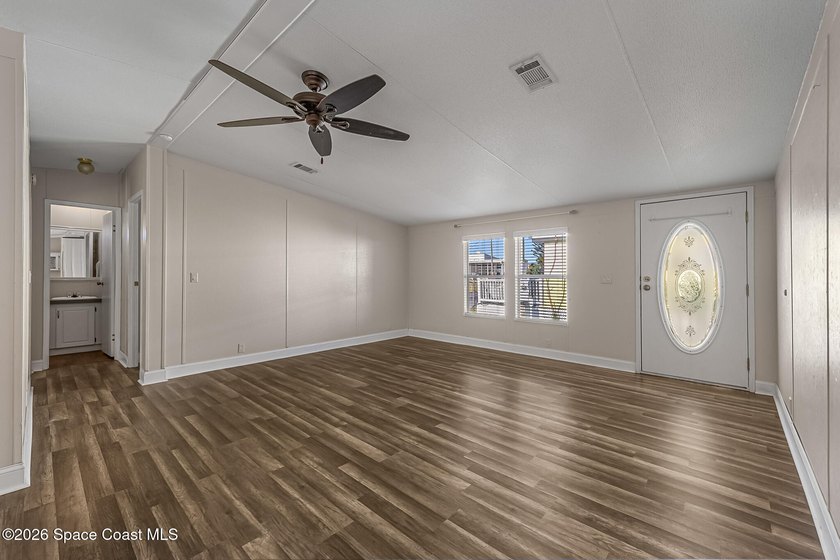 Enjoy this charming 3-bed, 2-bath home in Palm Bay Estates, a - photo 3