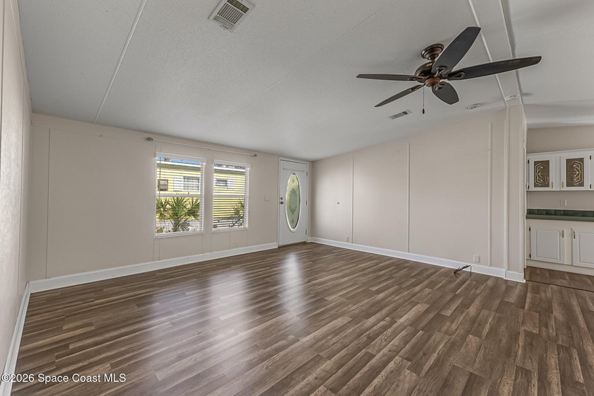 Enjoy this charming 3-bed, 2-bath home in Palm Bay Estates, a - photo 4