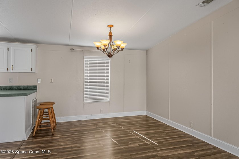 Enjoy this charming 3-bed, 2-bath home in Palm Bay Estates, a - photo 6