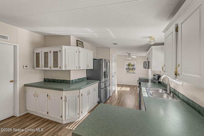 Enjoy this charming 3-bed, 2-bath home in Palm Bay Estates, a - photo 8